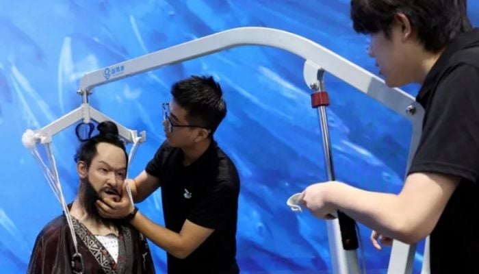 Life-like robots for sale to the public as China opens new store