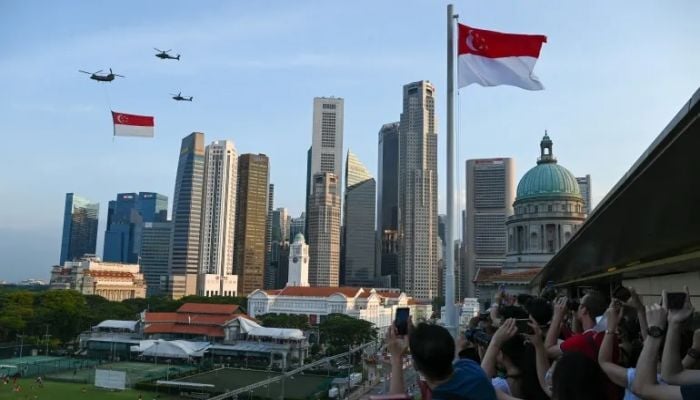 Singapore celebrates success on 60th anniversary but challenges loom ahead