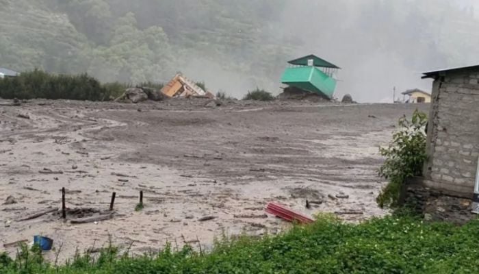 More than 100 missing after flash floods in India