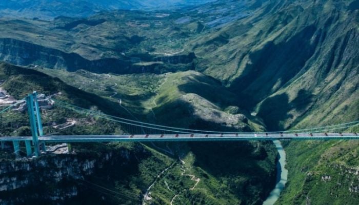 World's highest bridge opens to traffic in China
