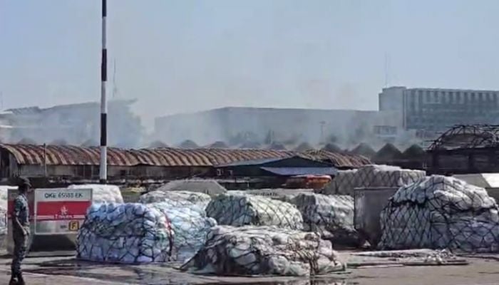 Cargo village fire not fully extinguished, smoke continues to rise