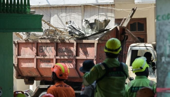 Death toll from Indonesia school collapse rises to 63