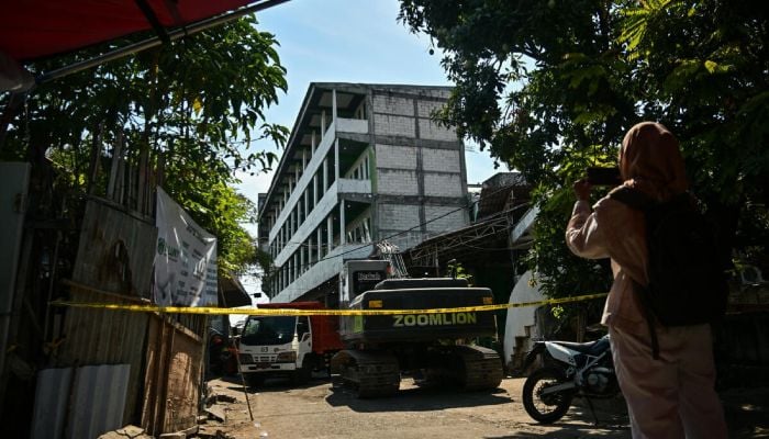 Indonesia school collapse toll hits 67 as search ends