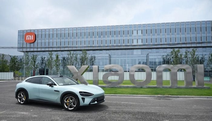 Xiaomi says electric cars and AI now profitable