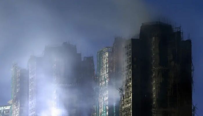 Hong Kong fire kills at least 94 as rescuers search towers for hundreds missing