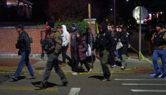 Police hunt gunman who killed two at US university