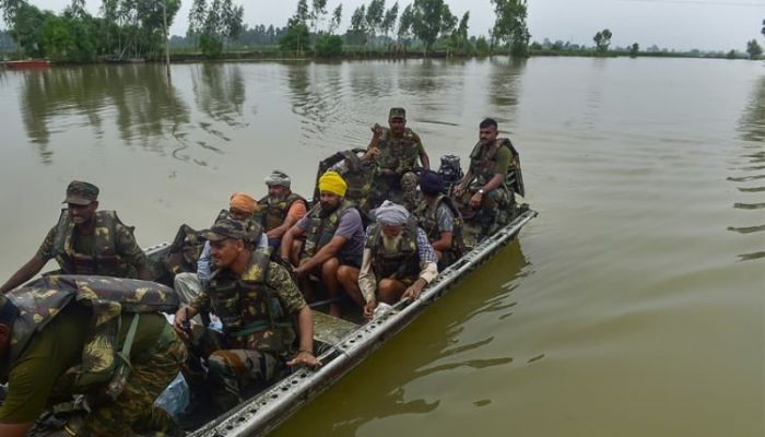 Militaries come to aid of Asia flood victims as toll nears 1,000