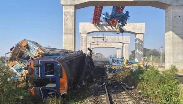 At least 12 dead as crane collapses onto train in Thailand