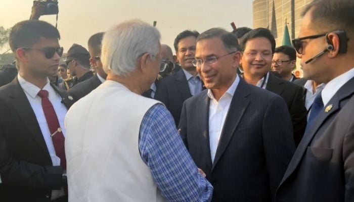 Prof Yunus exchanges greetings with PM