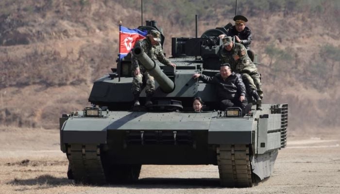 North Korean leader's teenage daughter drives tank in latest public appearance