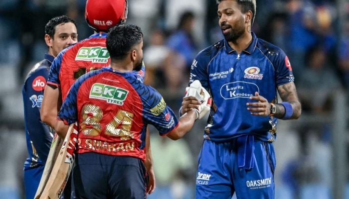 Punjab down Mumbai despite De Kock ton