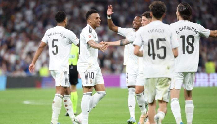 Real Madrid end troubled Liga season with win