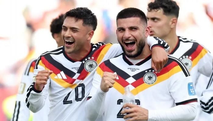 Germany beat Ivory Coast to reach World Cup knockouts