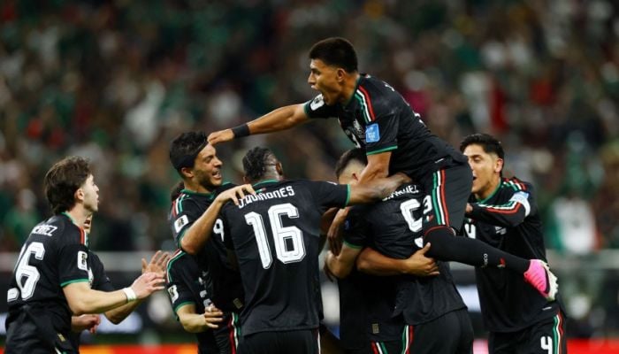 Mexico become first team to reach World Cup knockout phase