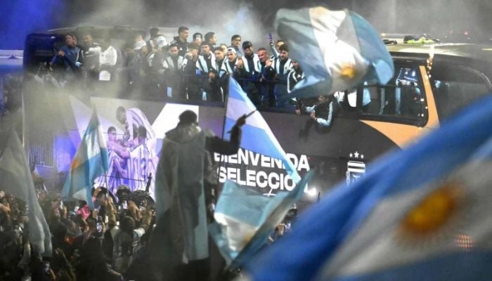 Thousands welcome home Argentina squad, without Messi, despite World Cup loss
