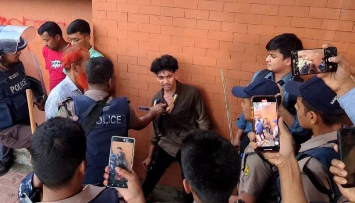 Police baton charge students in front of Sangsad Bhaban