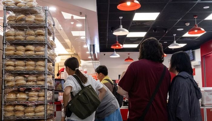 From coffee to hotpot, brands race to grab a bite of China's growing burger market