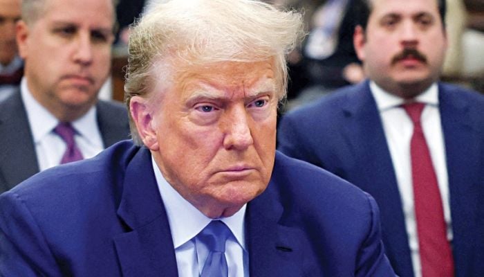 Trump hits Canada with import bans, 50% tariffs