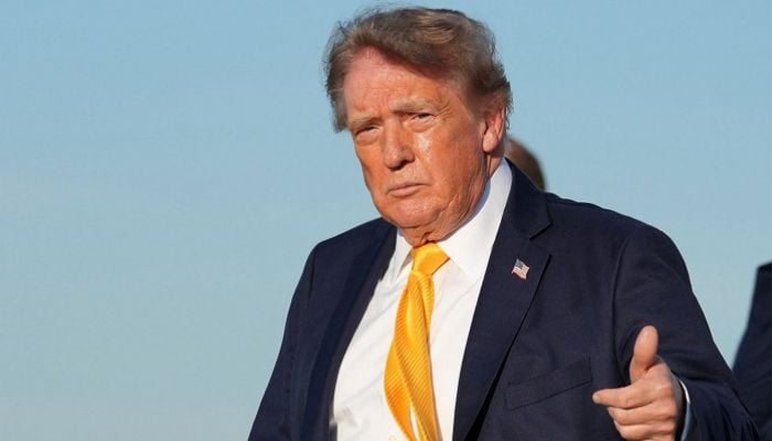 Trump cuts short weekend, returns to White House